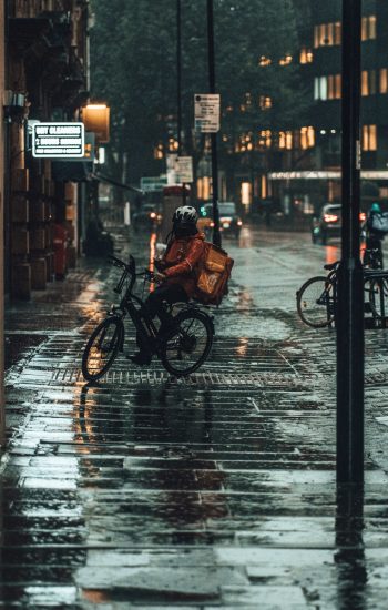 delivery rider in rain